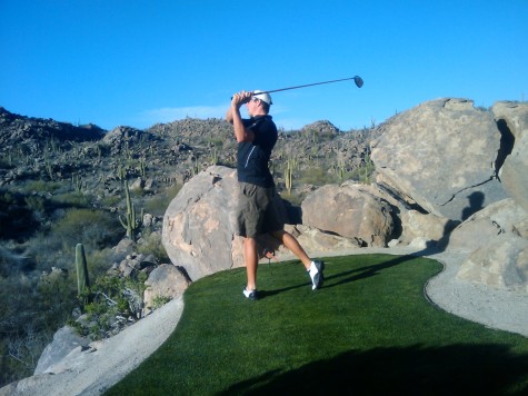 Todd finishes his swing in the desert