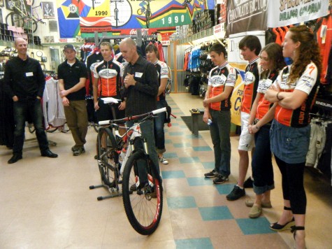 Gaige Sippy introduces each of the athletes at the Team Presentation. L-R, Chris Wherry, Joey Thompson, Colton Andersen, Gaige, Alicia Rose Pastore, Howard Grotts, Tad Elliott, Sage Wilderman, and Teal Stetson-Lee