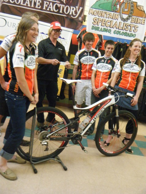 Greg Herbold of Sram drove up from Moab for the event and is pumped on the new team. He is seen here offering his "HB" name-tag as a trade for the sweet Specialized bike. 