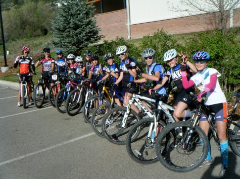 The U14 Girls team poses at Chapman Hill after a sweet IHBC course preride practice. Guest coach Mellissa Mayer came with as the team gave Assistant Coach a farewell practice before she heads to Europe tomorrow for a 3 week USA Cycling development camp! Coach Alicia is a 2 time defending junior womens National Champion. Translation; shes the fastest girl under 18 in the United States!