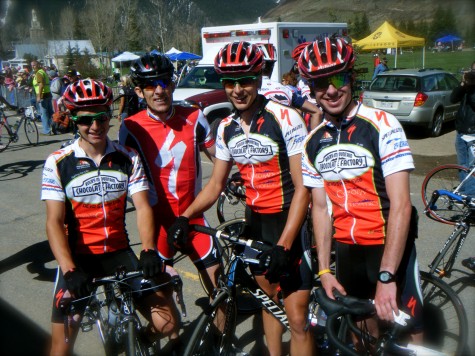 The mens RMCF Sweet Elite team poses with The Captain at the finish line