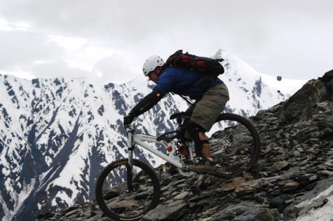 Miguel riding down mountains in Alaska